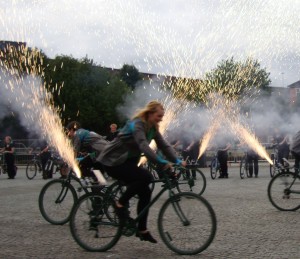 Image of gerb pyrotechnics firing from back of bikes