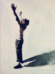 Image of Chris with his arms raised to the sky